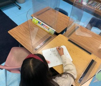  child at desk